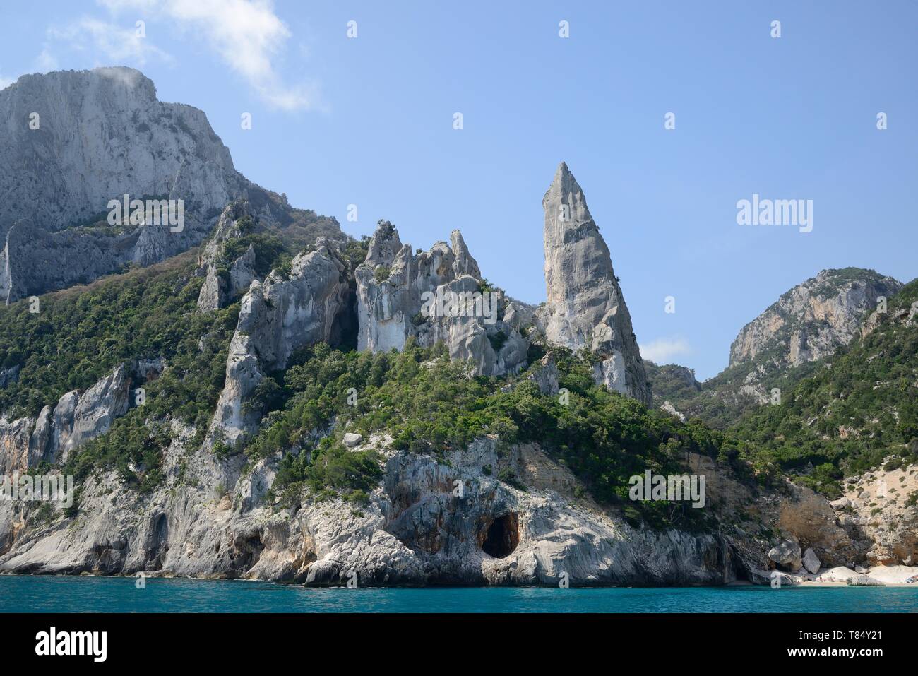 Monte Caroddi / Aguglia limestone rock pinnacle on the coast, Cala Goloritze, Gulf of OroseiGennargentu National Park, Baunei, Sardinia, Italy, June 2 Stock Photo