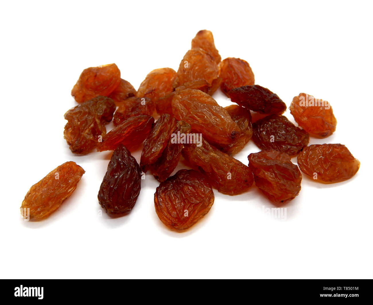 dried sultana fruits on white background Stock Photo - Alamy