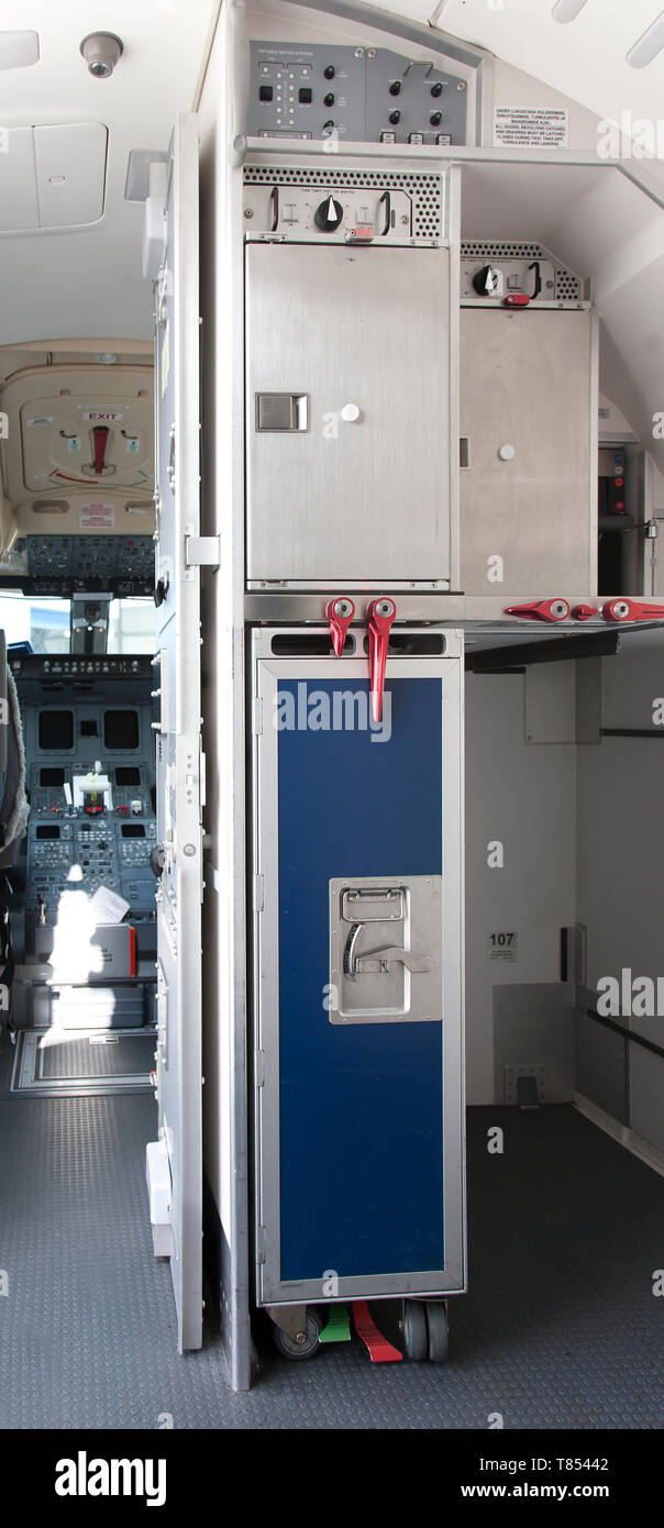 Food Compartment on an Airplane Stock Photo - Alamy