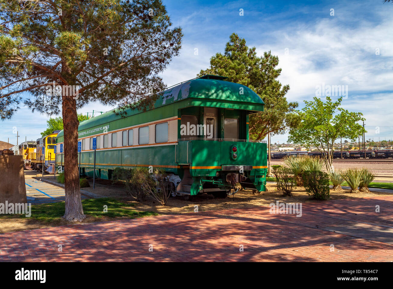 Barstow, CA / USA – April 14, 2019: Green vintage railroad passenger car at the Western America Railroad Museum located at the Barstow Harvey House at Stock Photo