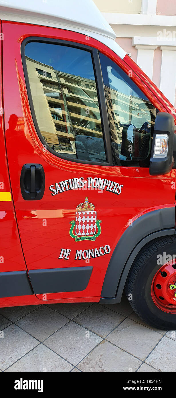 Monte-Carlo, Monaco - March 28,  French Red And White Fire Department Ambulance Van (Close Up View) Parked In The Street Of Monaco, With Lights, Frenc Stock Photo