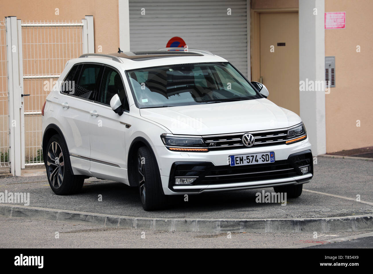 Roquebrune-Cap-Martin, France - May 8, 2019: Luxury White Volkswagen Tiguan 2.0 TDI 240 R-Line SUV Parked In The Street, Compact Crossover Vehicle (CU Stock Photo