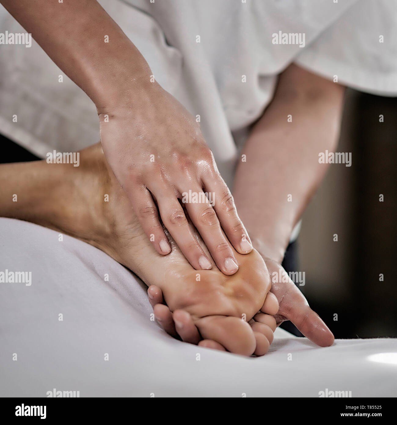 Foot massage Stock Photo