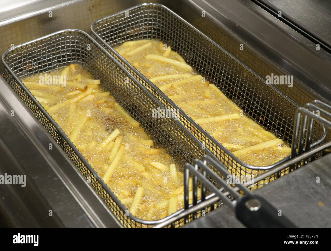 Deep Fat Fryer Chips Stock Photos & Deep Fat Fryer Chips Stock Images