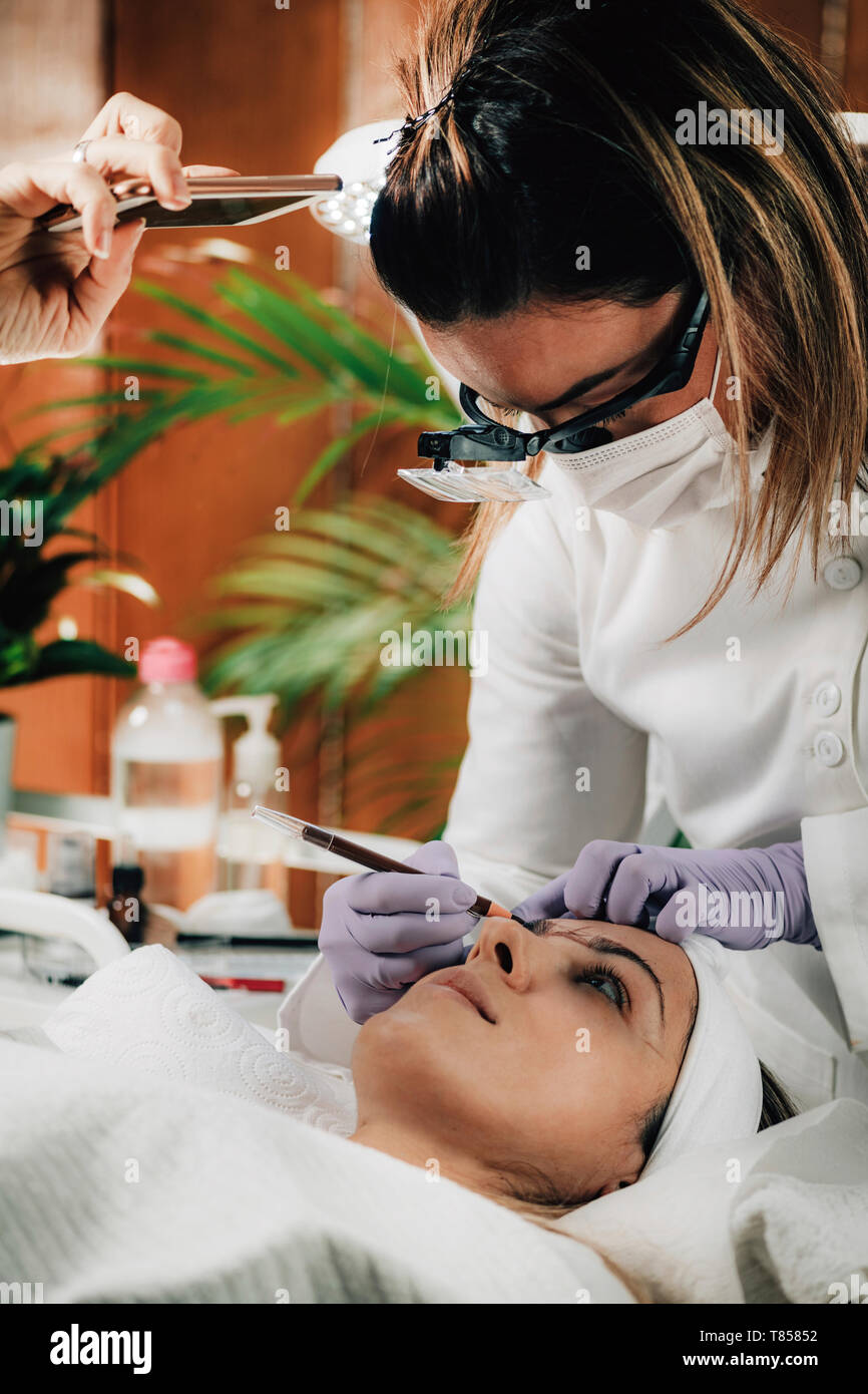 Eyebrow microblading Stock Photo