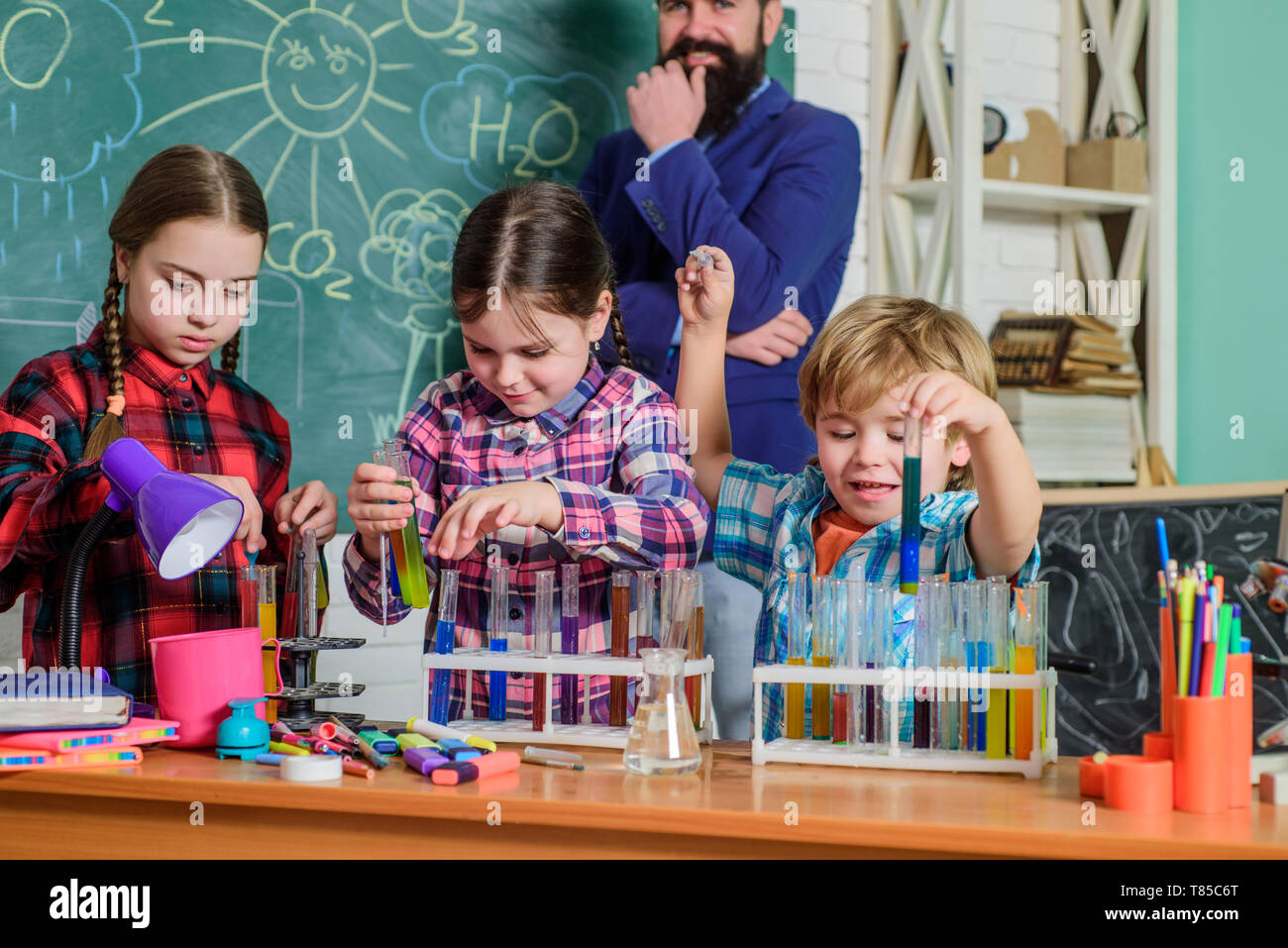 Science and education. chemistry lab. back to school. happy children