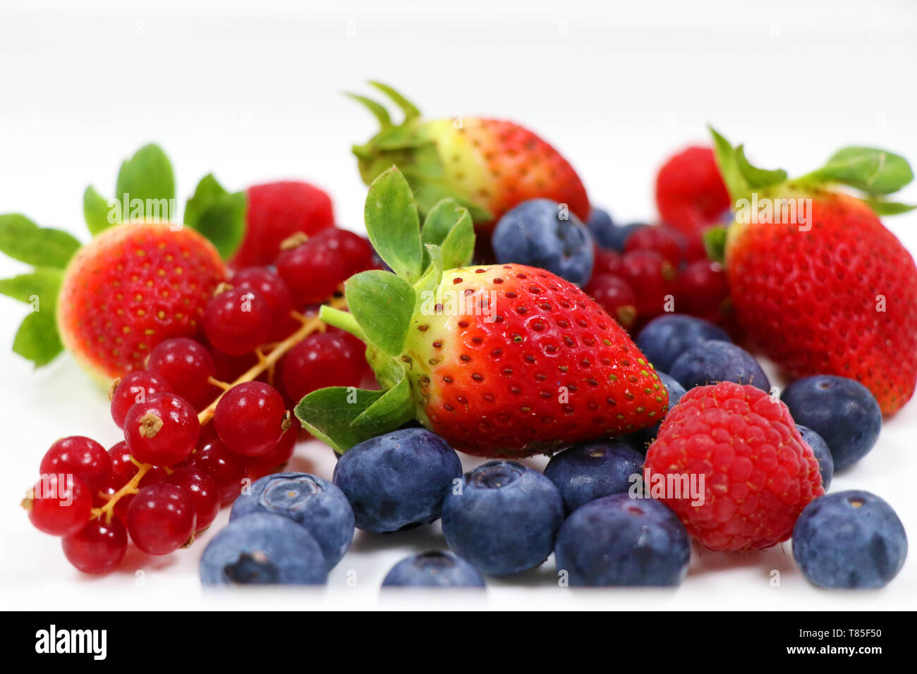 mix fresh berries isolated with white background Stock Photo
