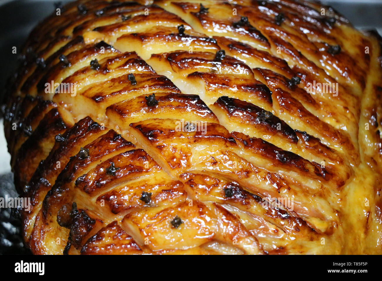 slow roasted gammon in the oven Stock Photo Alamy