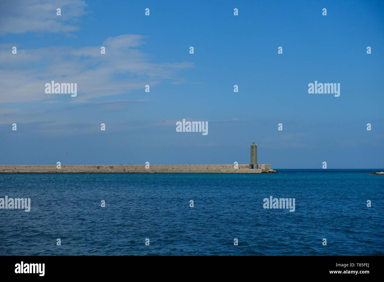 Lighthouse on water in Bari, Italy Stock Photo