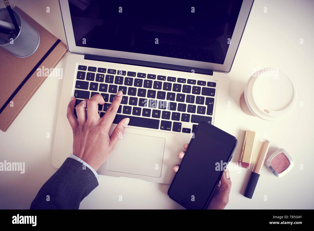 Business woman using laptop Stock Photo