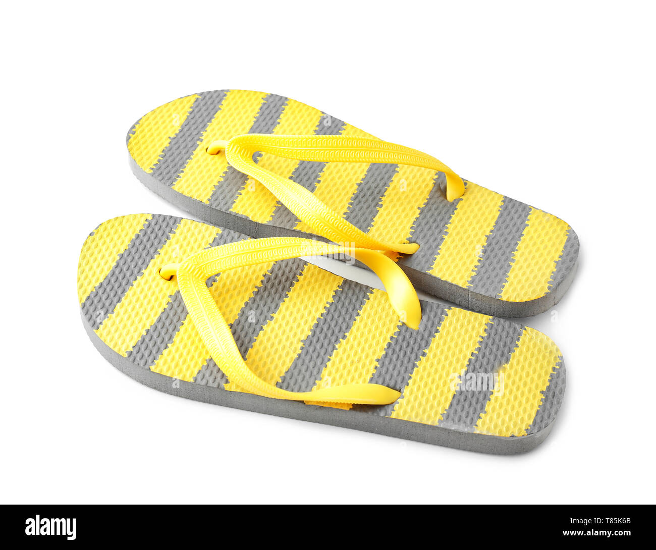 Female beach flip-flops on white background Stock Photo - Alamy