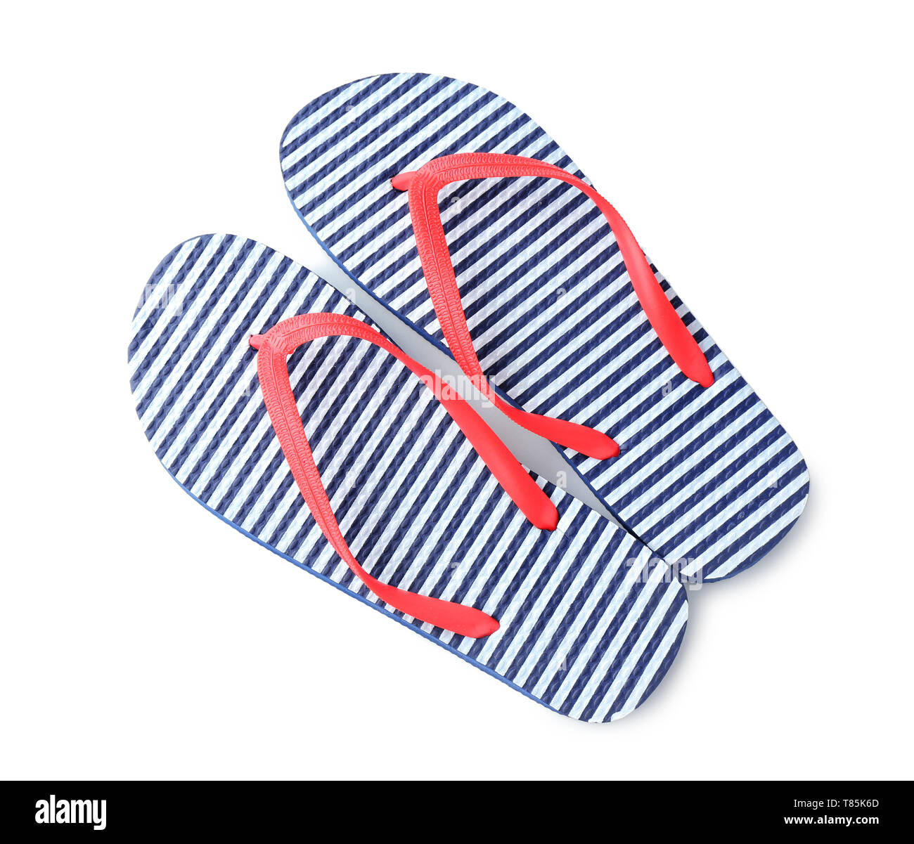 Female beach flip-flops on white background Stock Photo - Alamy
