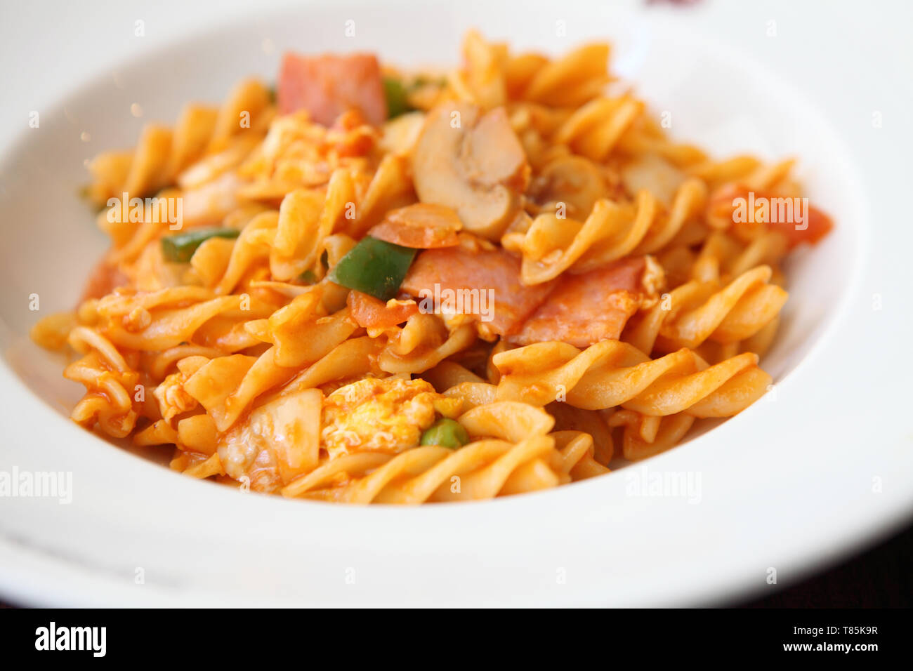 pasta with ham and tomato Stock Photo Alamy