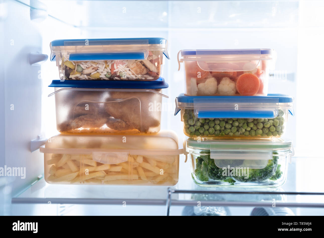 https://c8.alamy.com/comp/T85MJ4/stacked-of-plastic-containers-with-various-food-store-in-refrigerator-T85MJ4.jpg