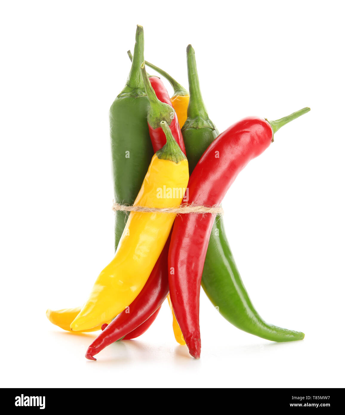 Different chili peppers on white background Stock Photo - Alamy
