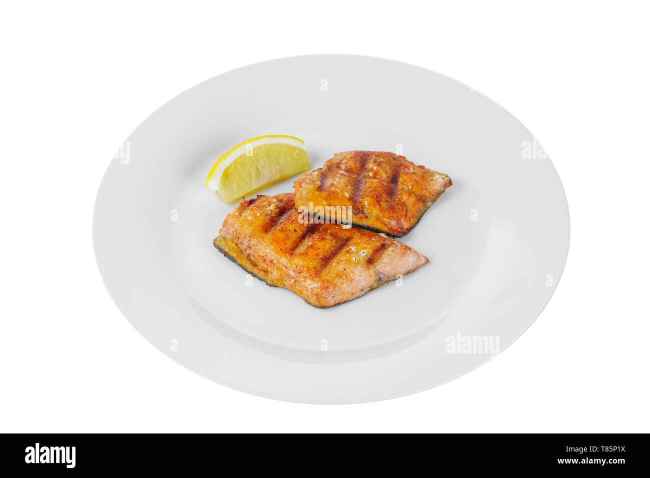 Fish, Trout, Chum Salmon, Humpback, A Piece Baked, Grilled, With A Slice Of  Lemon And Lettuce Stock Photo, Picture and Royalty Free Image. Image  125357561.