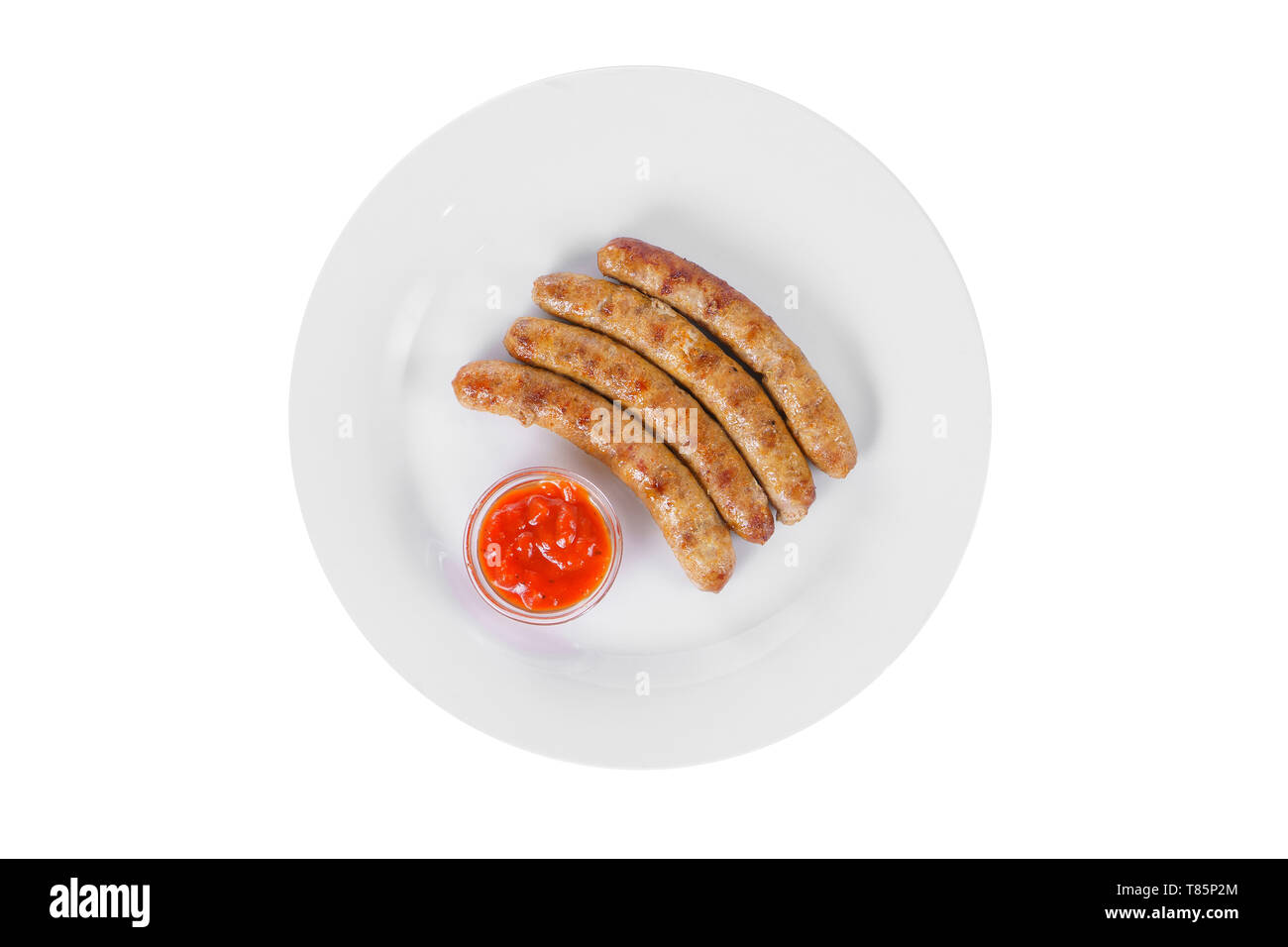 Four barbecue sausages, grilled, without garnish with tomato, spicy