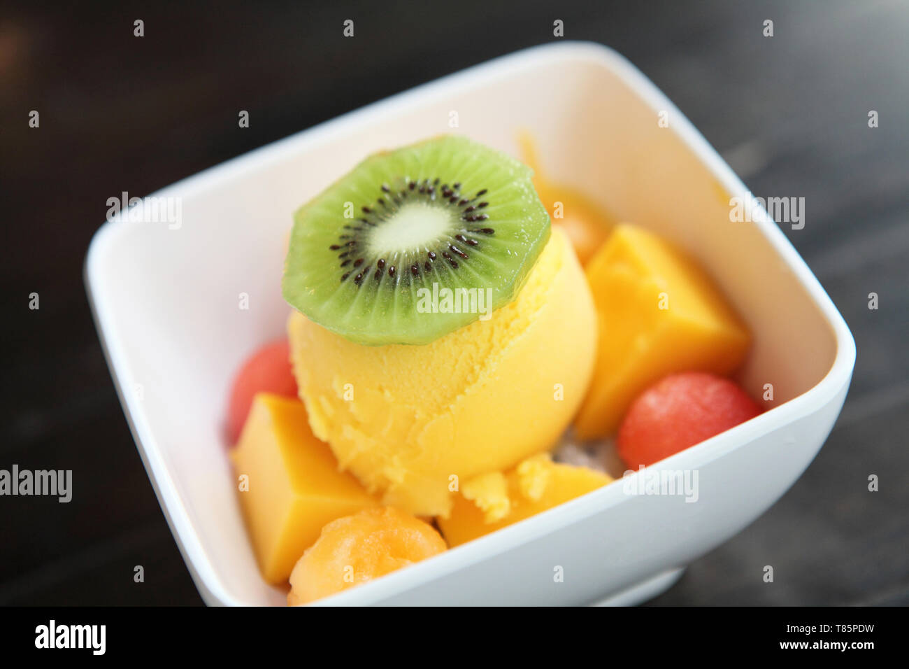 Scoops Of Mango Ice Cream Fruit Stock Photo Alamy