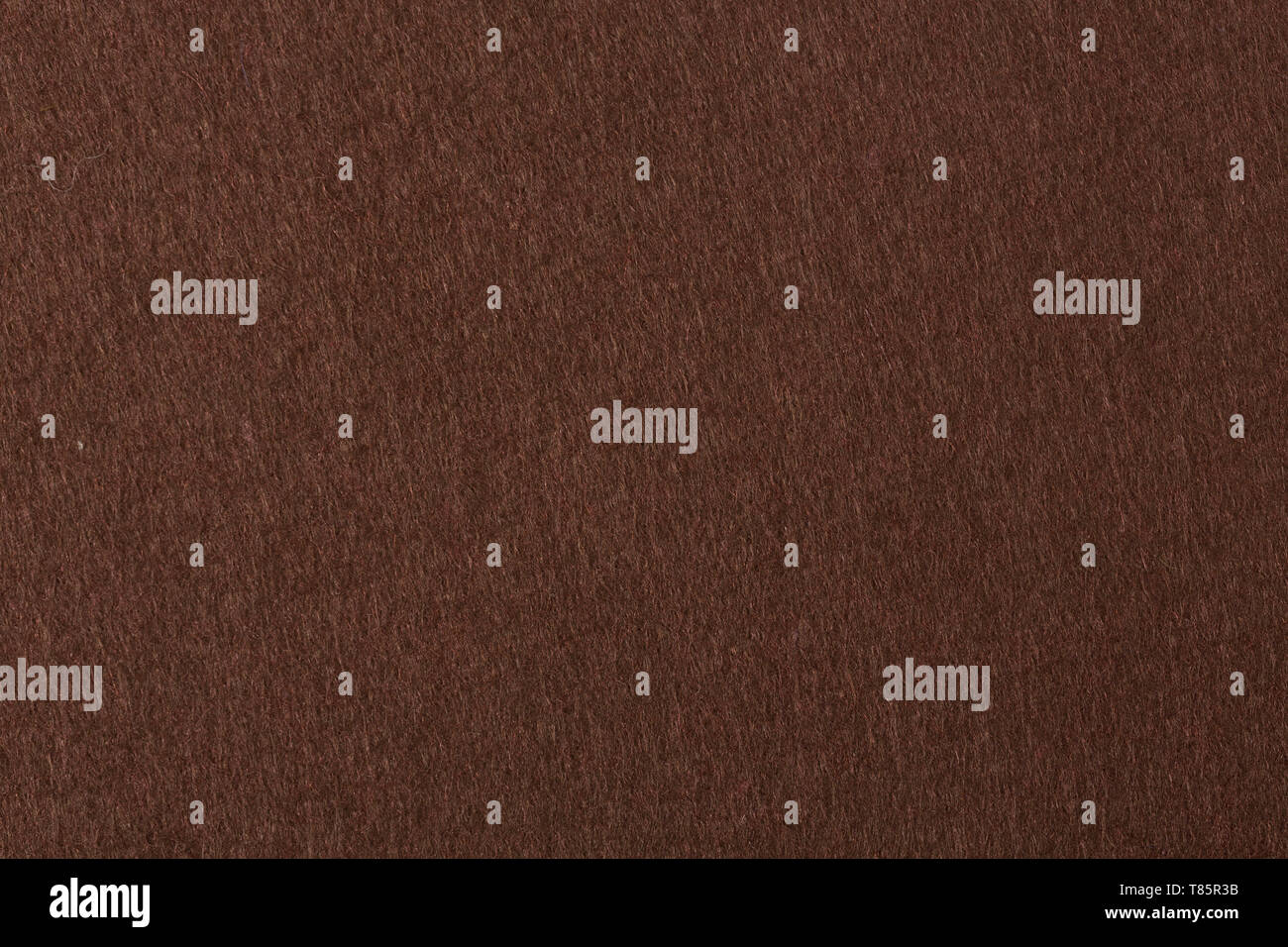 Dark brown felt texture as background. Felt wallpaper, pattern Stock