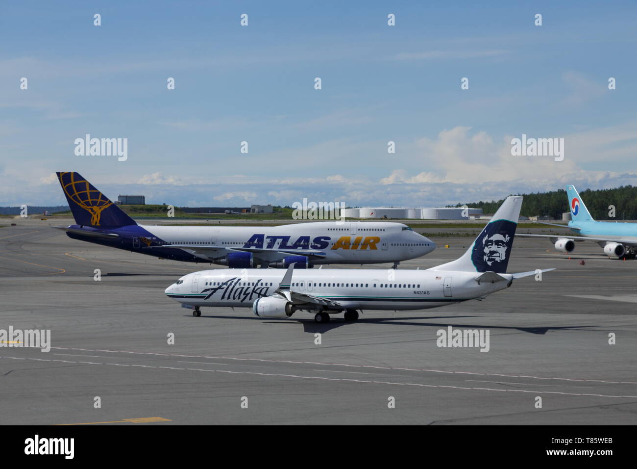 Atlas and Alaska Air in Anchorage Stock Photo