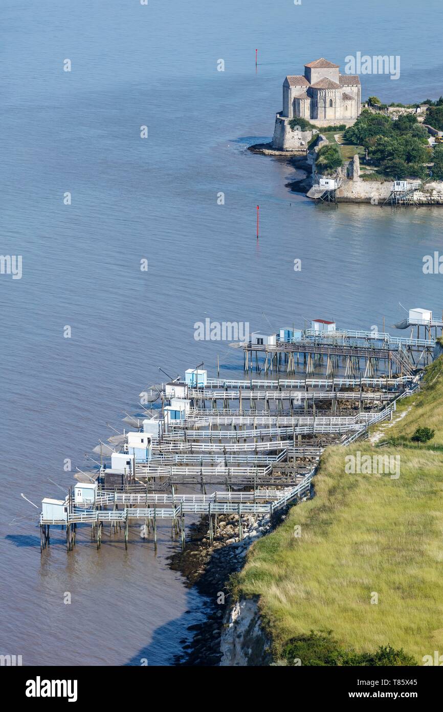 France, Charente Maritime, Talmont sur Gironde, labelled Les Plus Beaux Villages de France (The Most Beautiful Villages of France), the village on the Gironde river and the fishing cabins (aerial view) Stock Photo