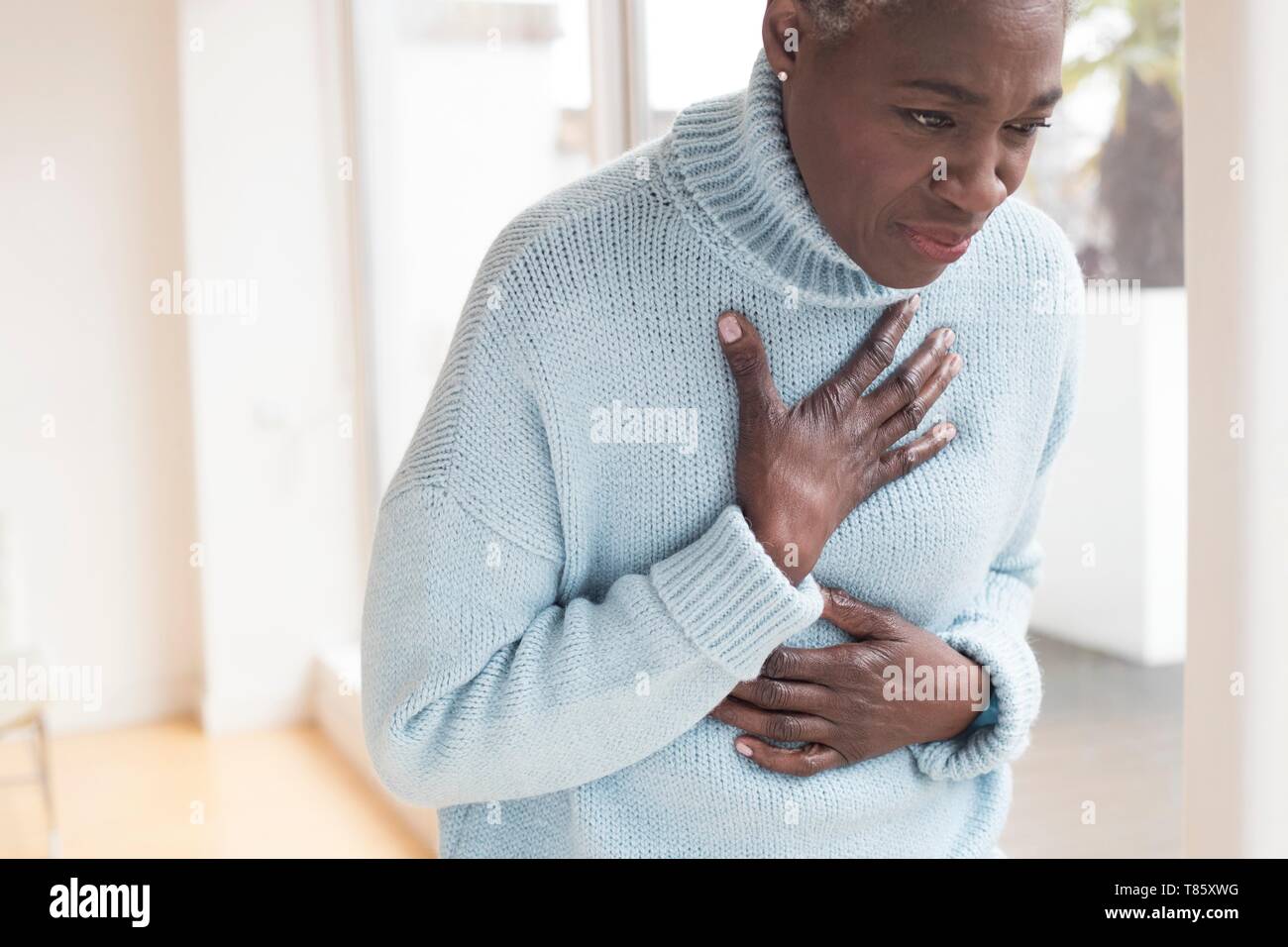 Woman chest pain hires stock photography and images Alamy