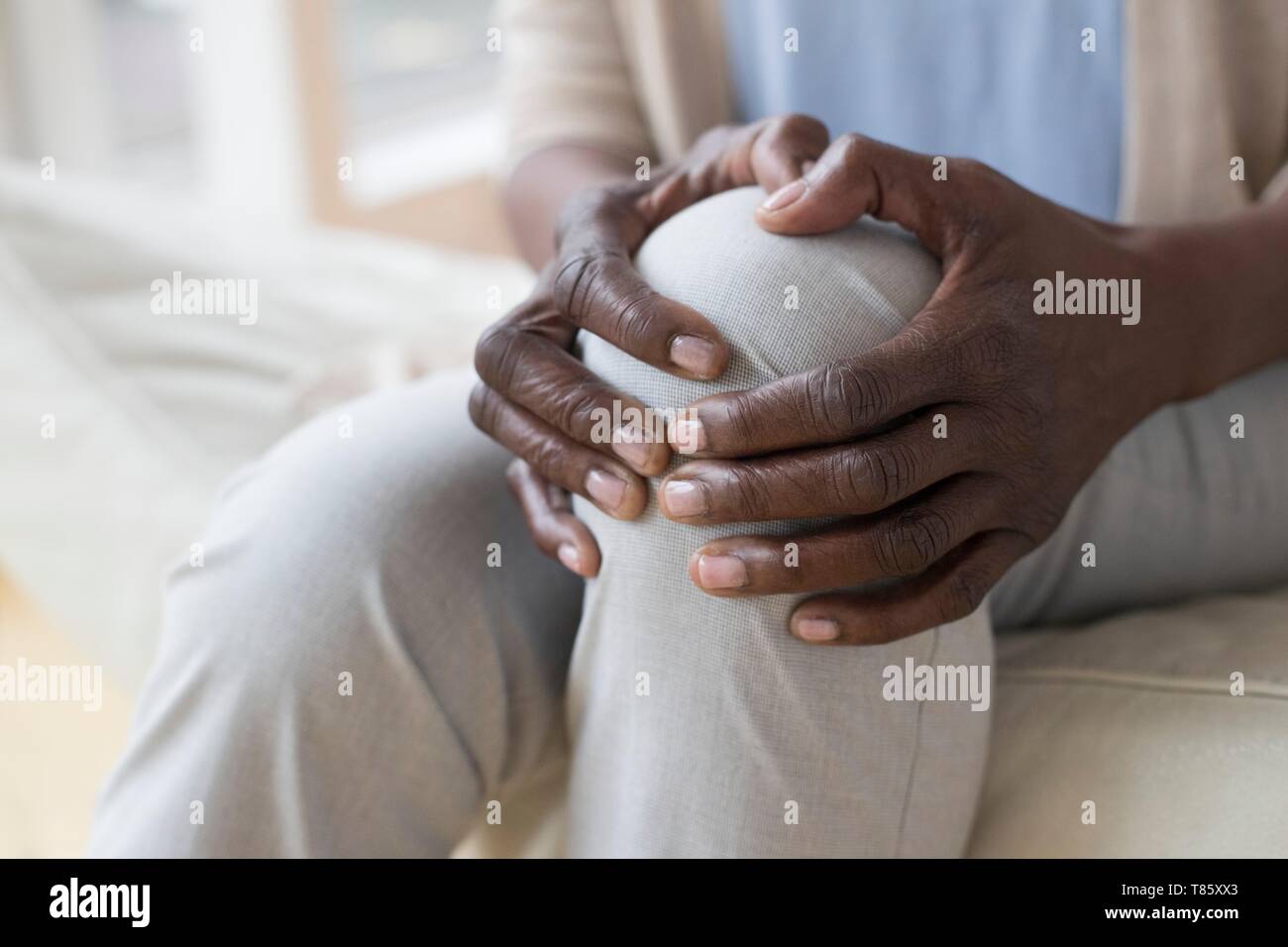 Woman with knee pain Stock Photo