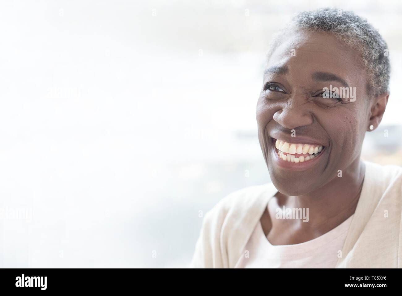 Mature woman smiling Stock Photo