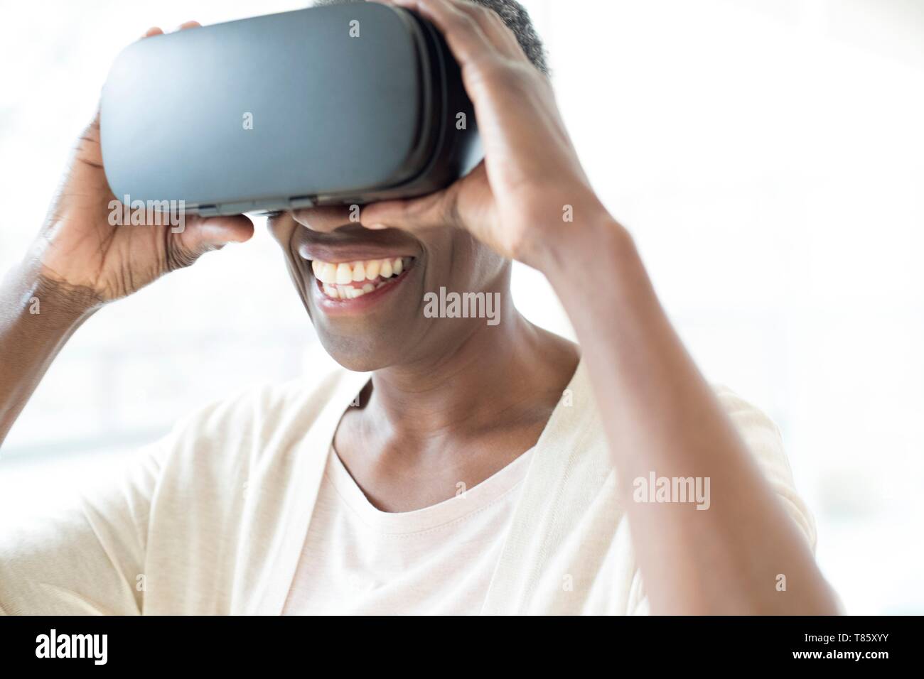 Woman wearing VR headset Stock Photo