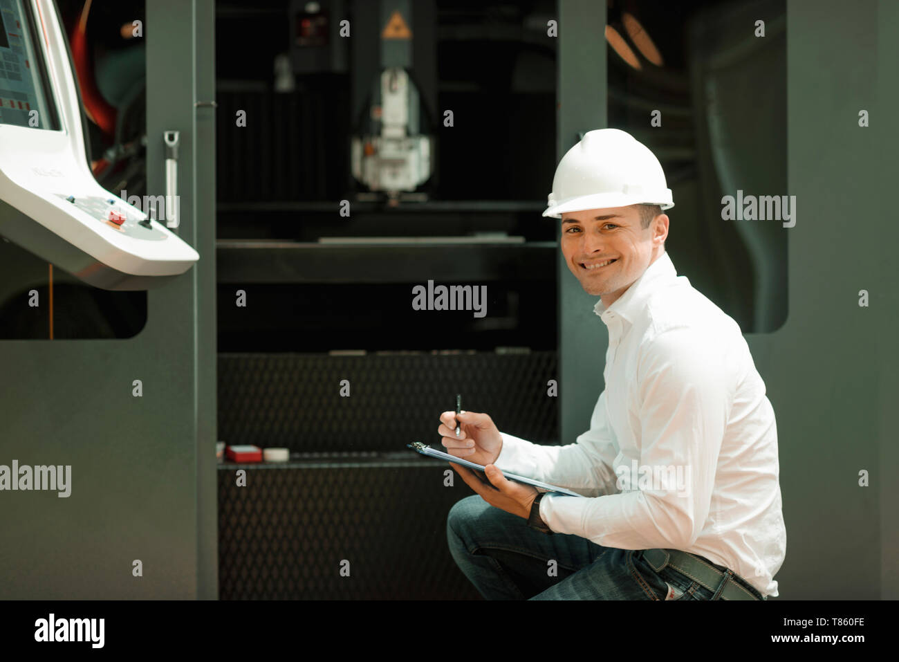 Engineer working in factory Stock Photo