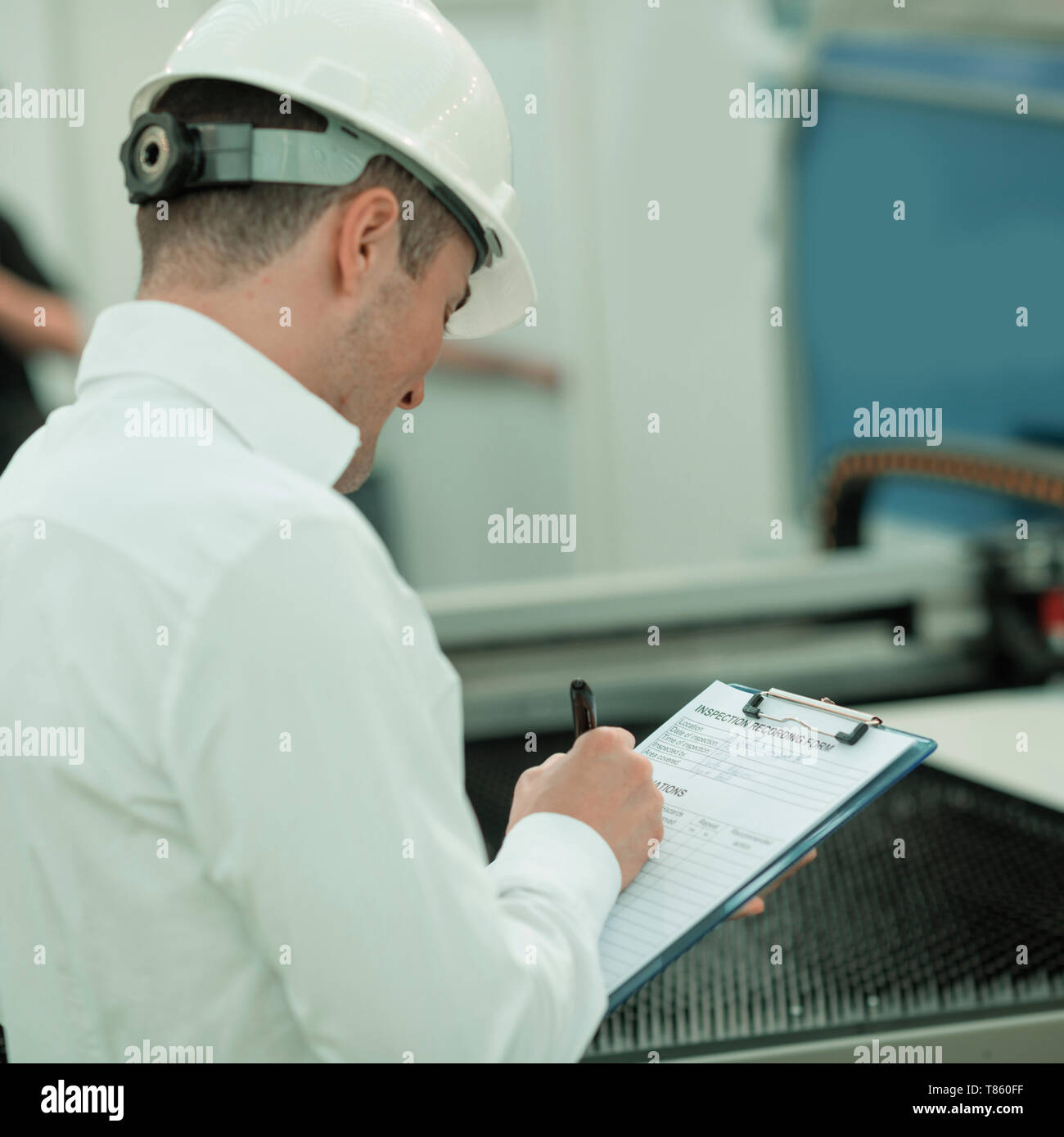Engineer working in factory Stock Photo