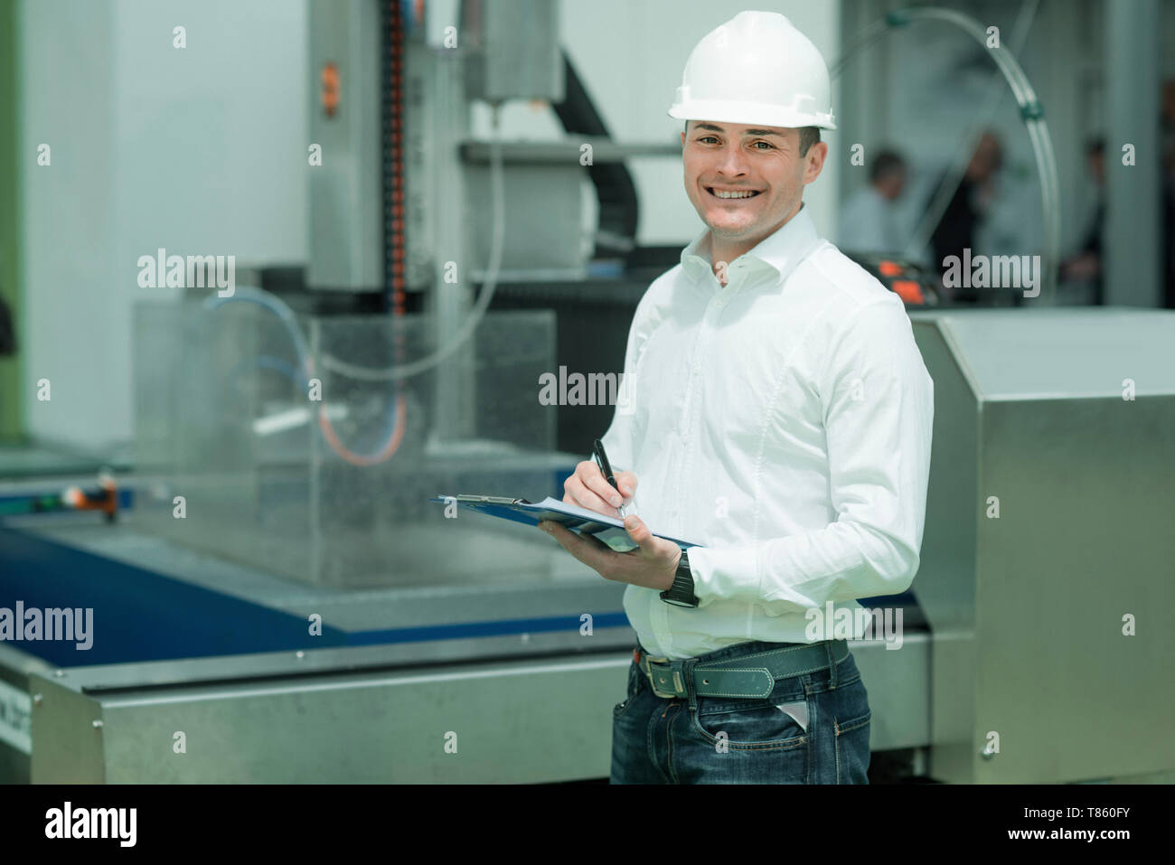 Engineer working in factory Stock Photo