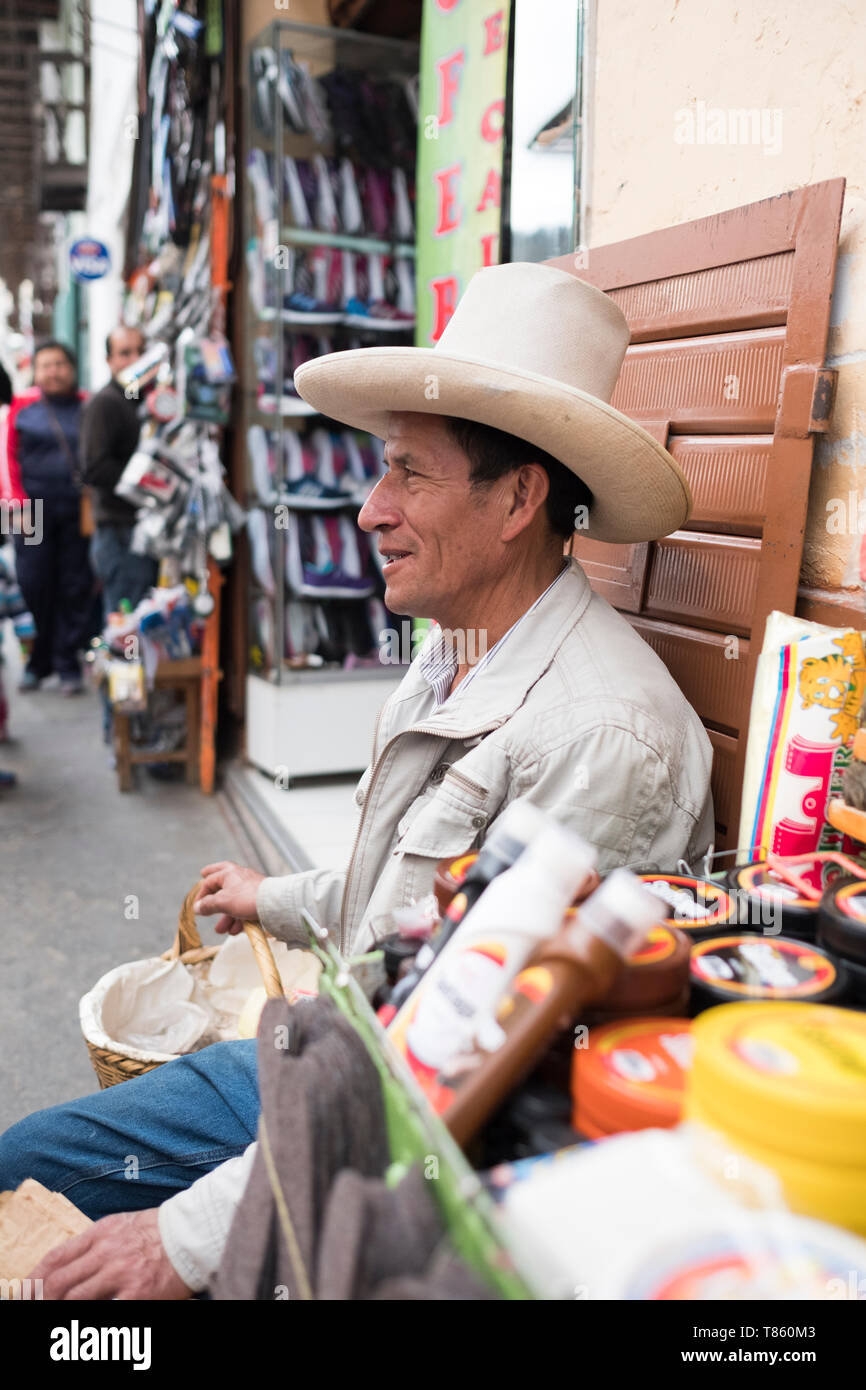 Local man wearing a Cajamarca Region traditional hat on the streets of Cajamarca, Peru Stock Photo