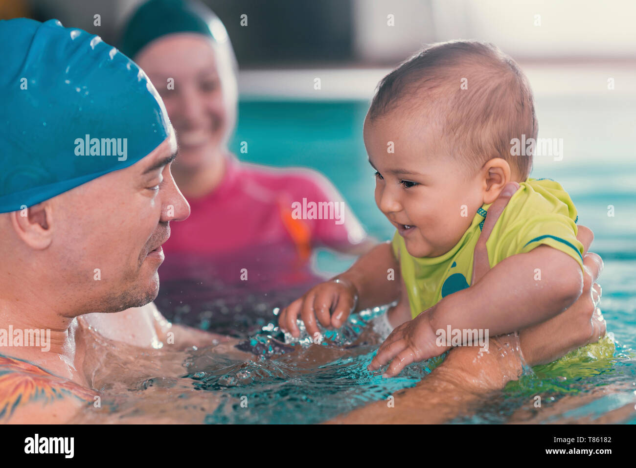 Baby swimming lesson Stock Photo Alamy