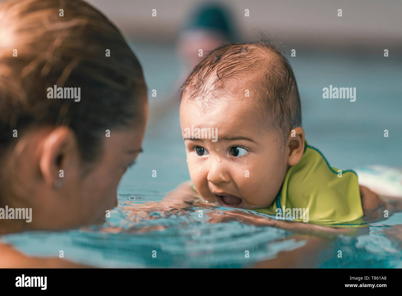 Baby swimming lesson Stock Photo Alamy