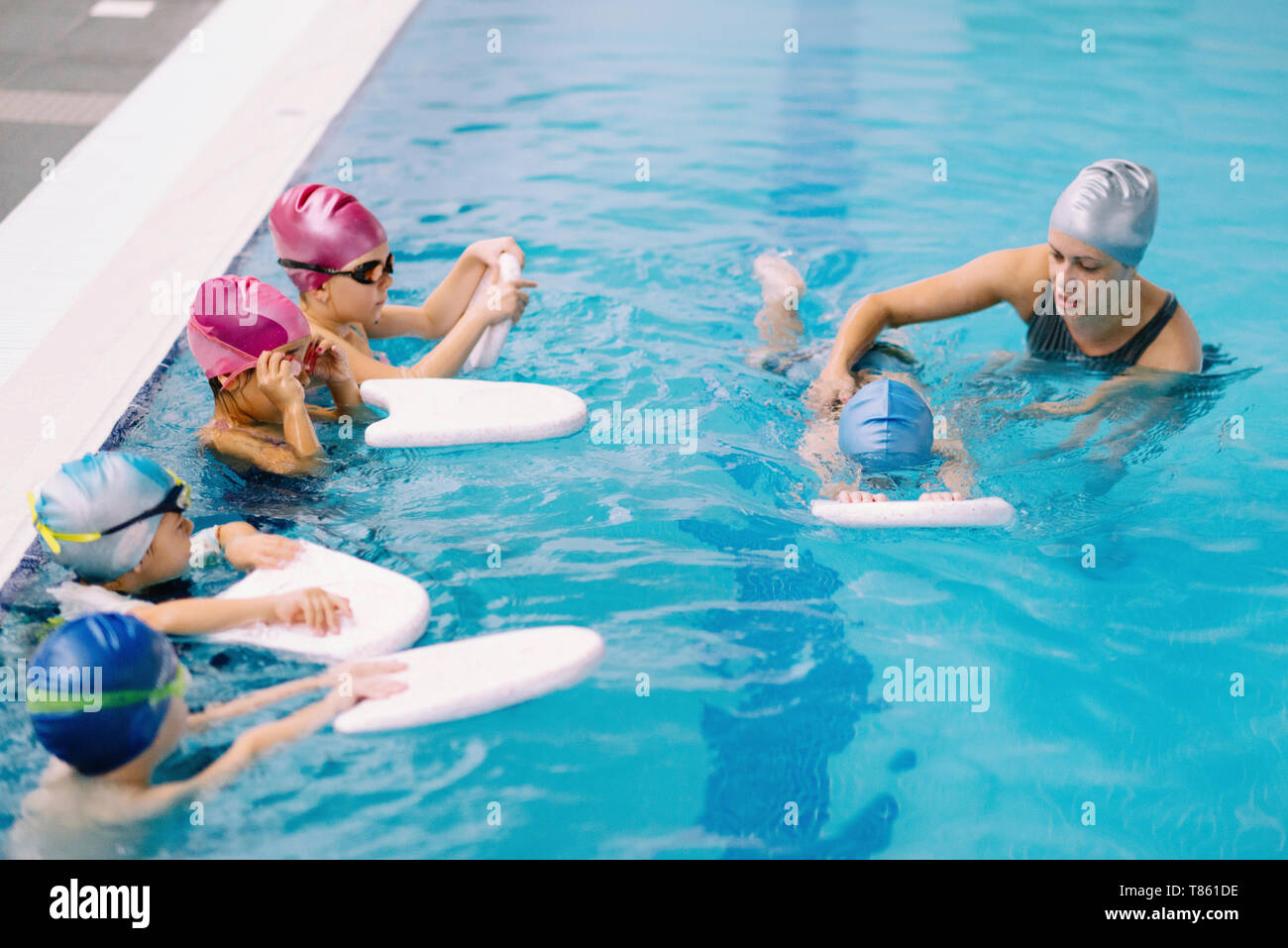 Group swimming lesson Stock Photo