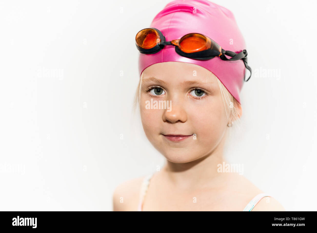 Girl with swimming cap and goggles Stock Photo Alamy