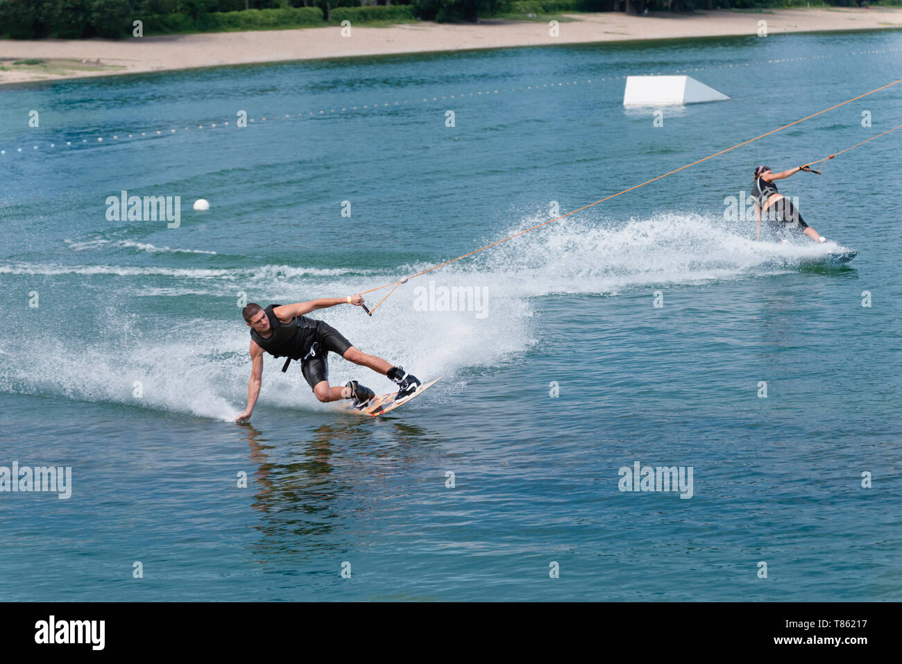 Tandem wakeboarding Stock Photo