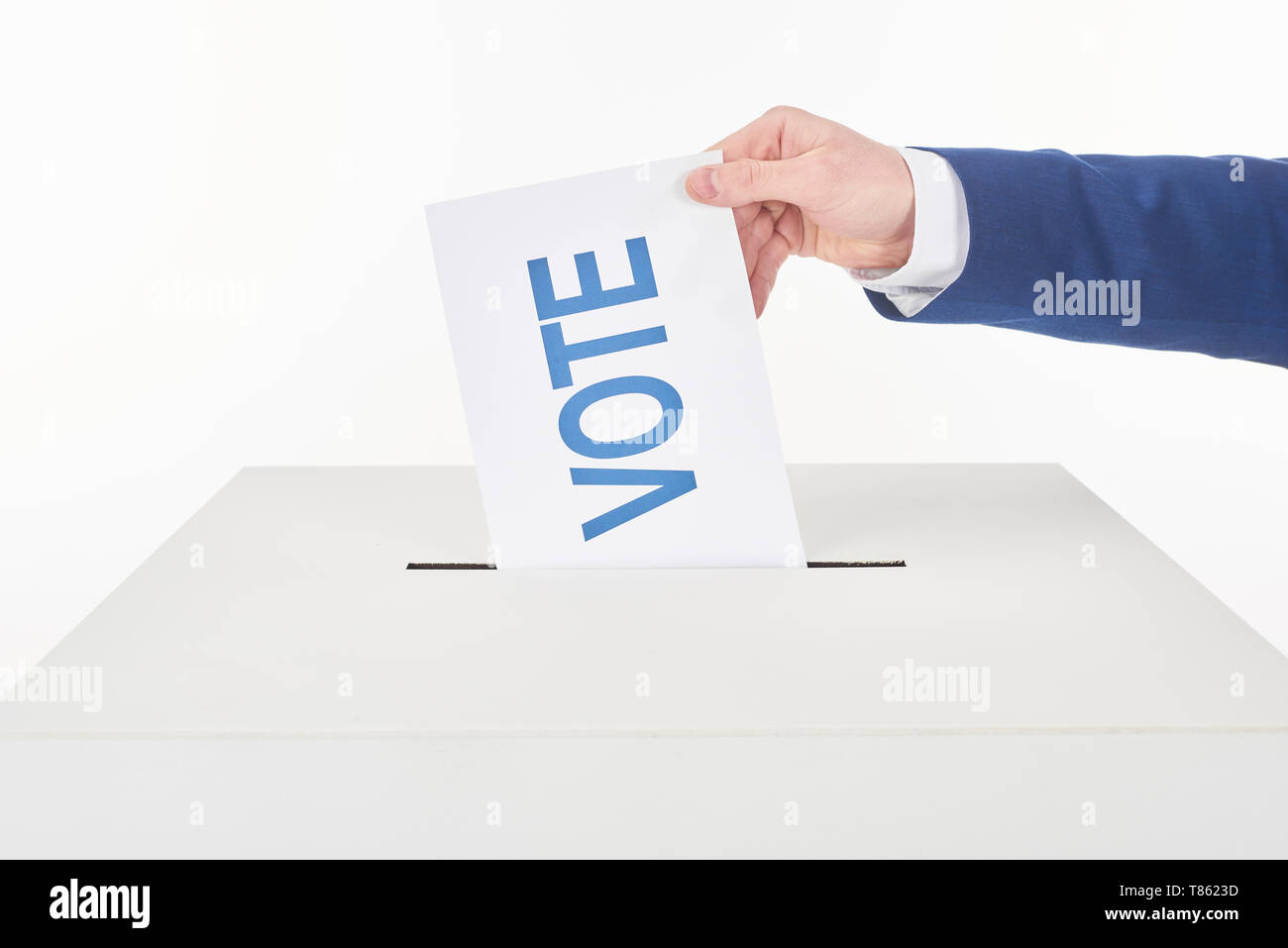Position Voting Tickets partial view of man putting card with vote lettering in box isolated on ...