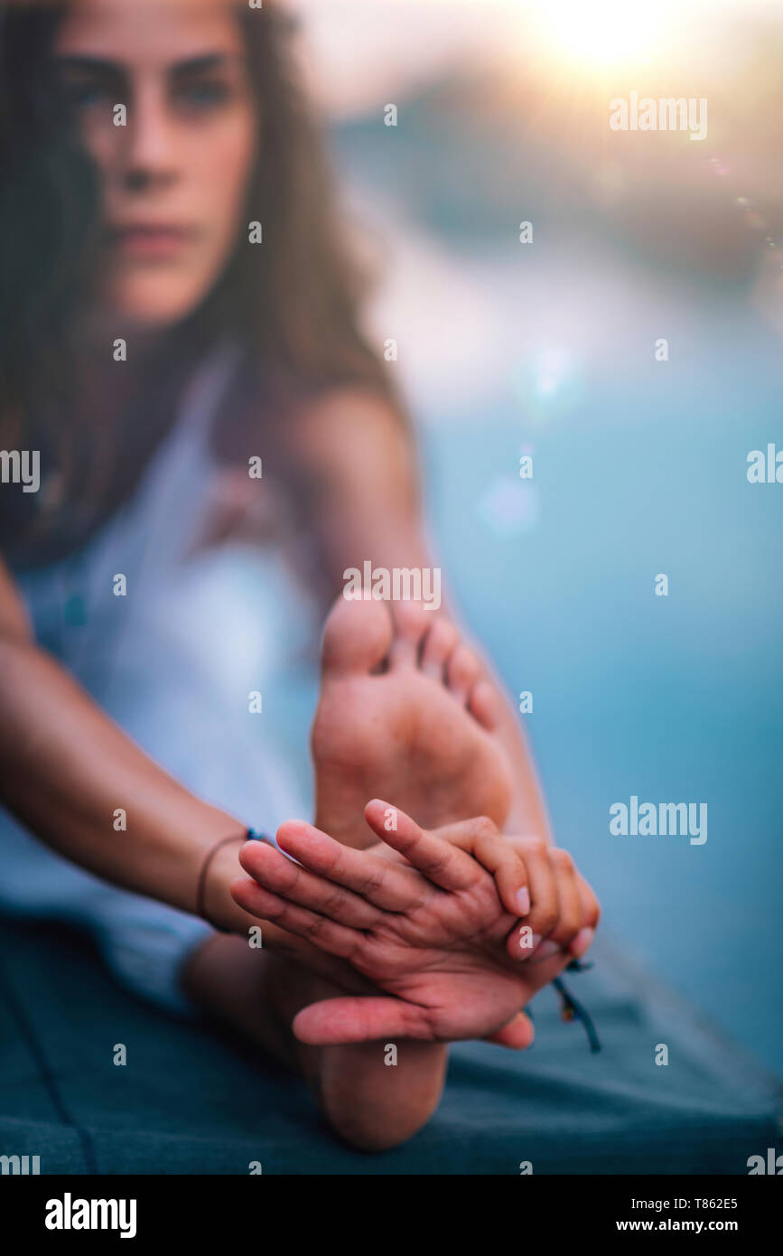 Seated forward bend yoga hi-res stock photography and images - Alamy