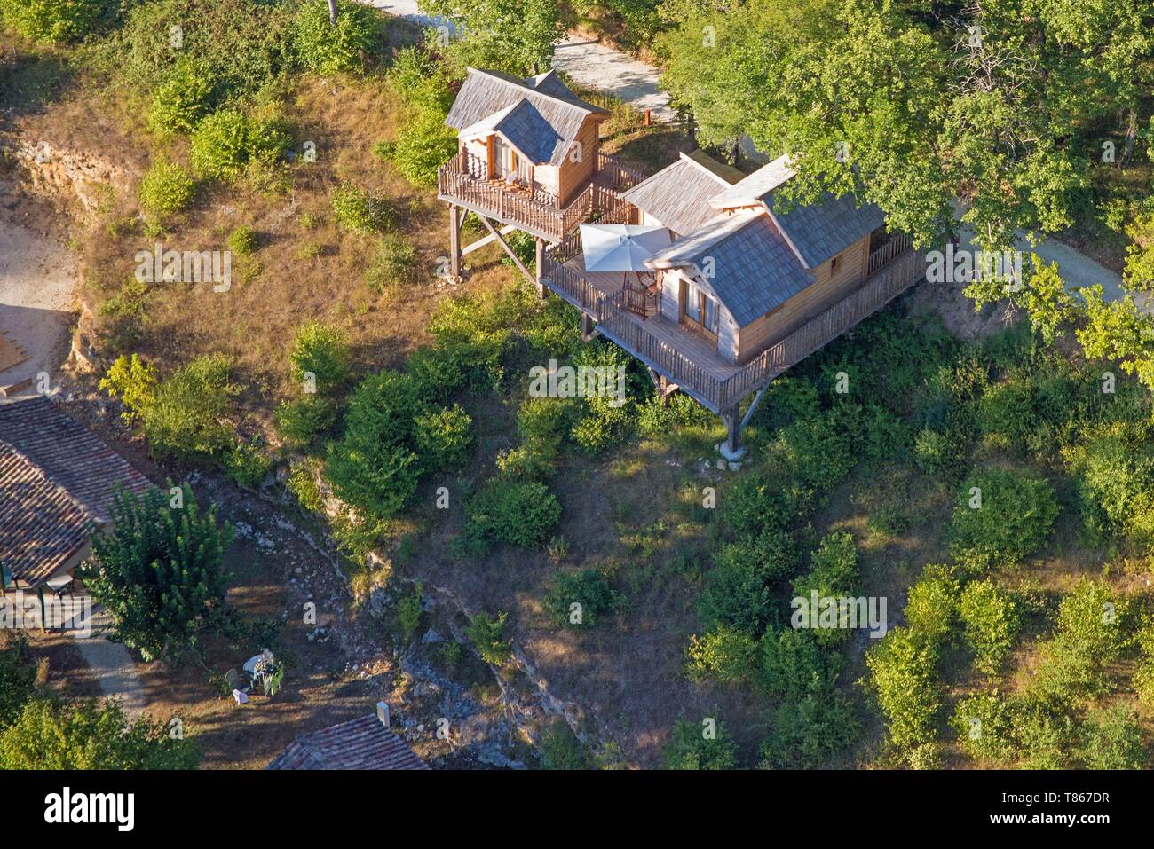 France, Dordogne, Beaumont du Perigord, wooden hut in a campsite (camping), unusual accommodations (hostings) References (aerial view) Stock Photo