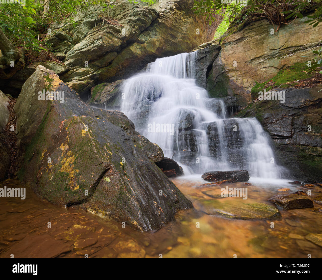 Base of Upper Cascade waterfall in Hanging Rock State Park, North Carolina, Scenic nature landscape photograph. Stock Photo