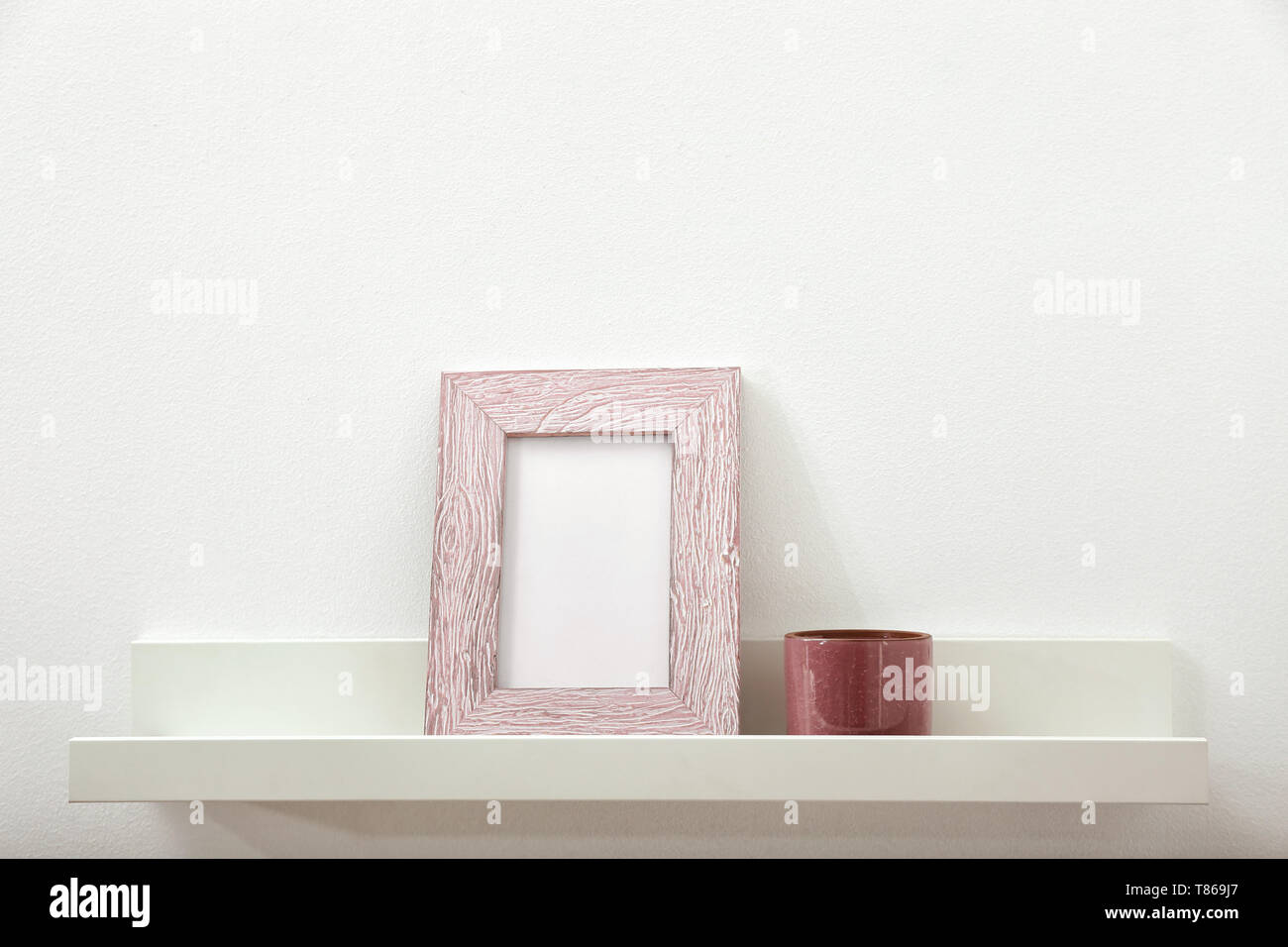 Blank photo frame on shelf hi-res stock photography and images - Alamy