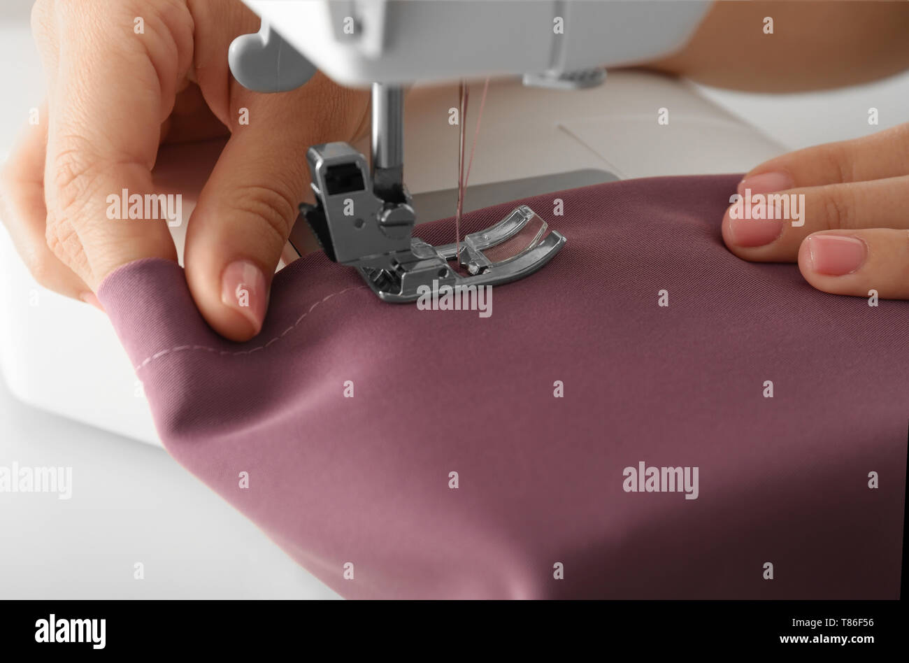 Closeup hands tailor using hi-res stock photography and images - Alamy
