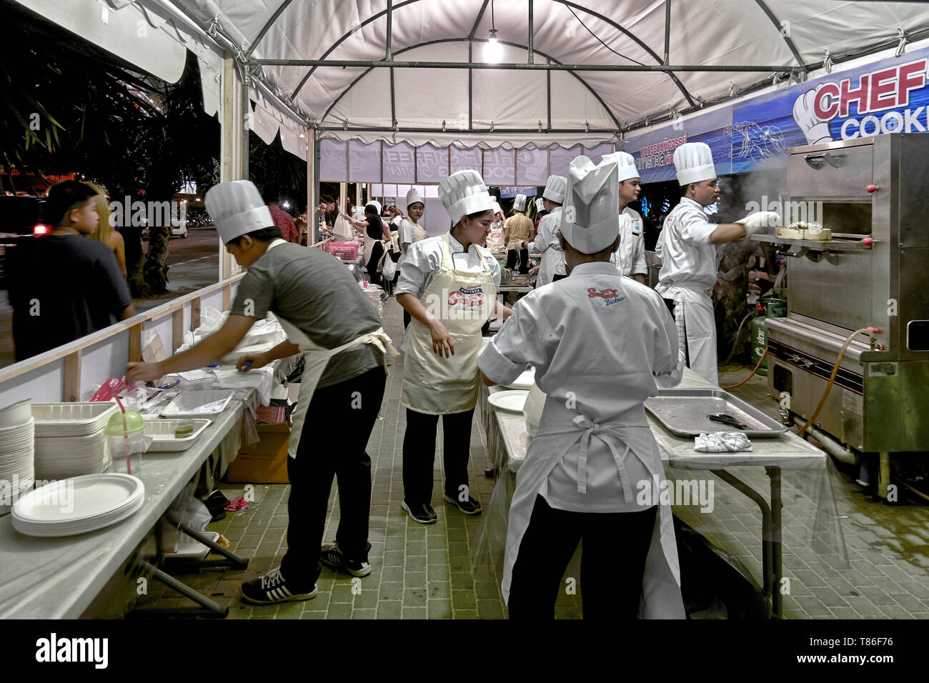 Chefs in the kitchen preparing food for the annual food festival at Pattaya Thailand Southeast Asia Stock Photo