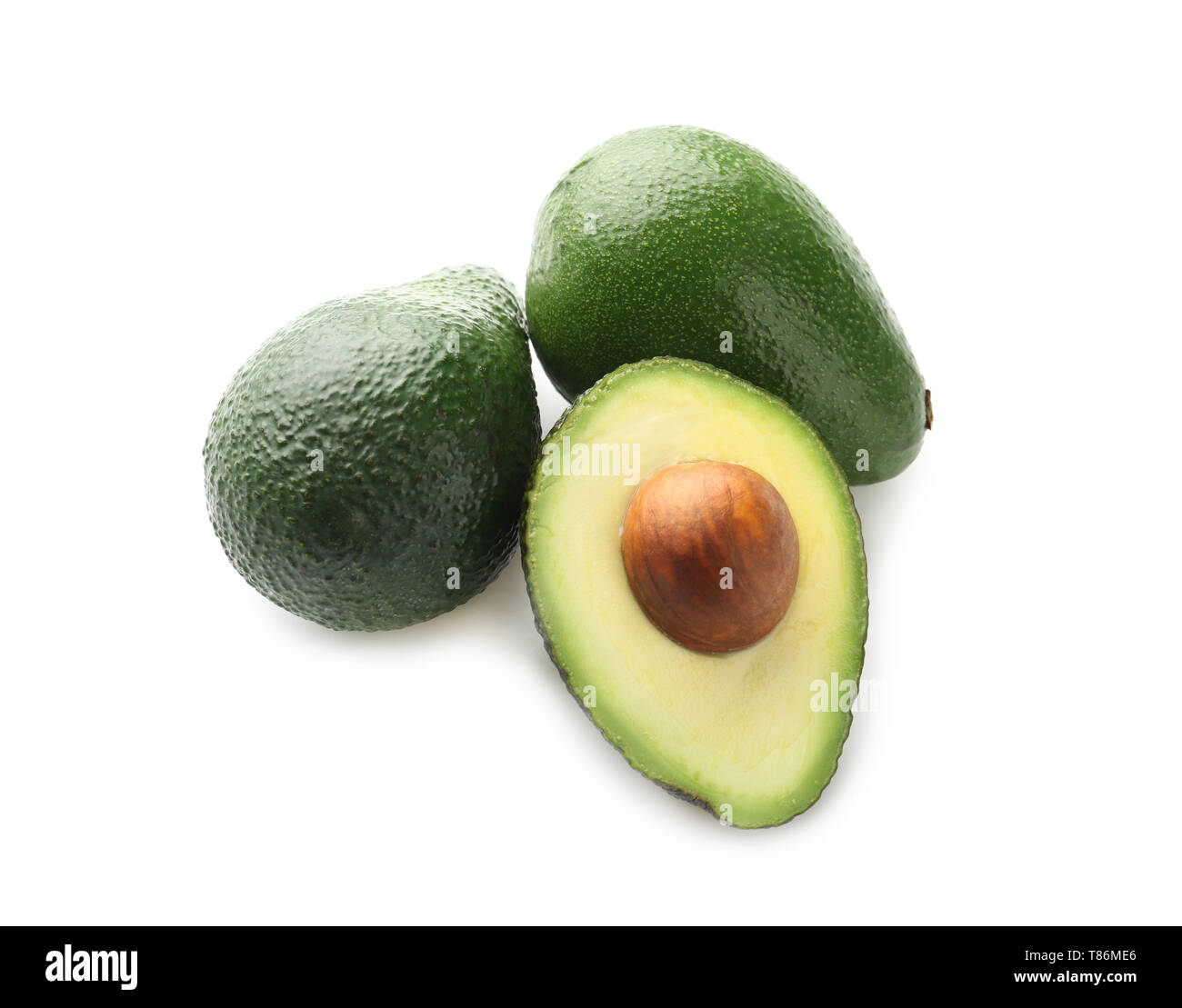 Fresh avocados on white background Stock Photo - Alamy