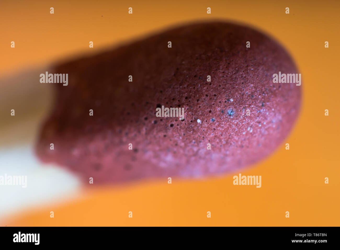 macro photo of a red match head Stock Photo Alamy
