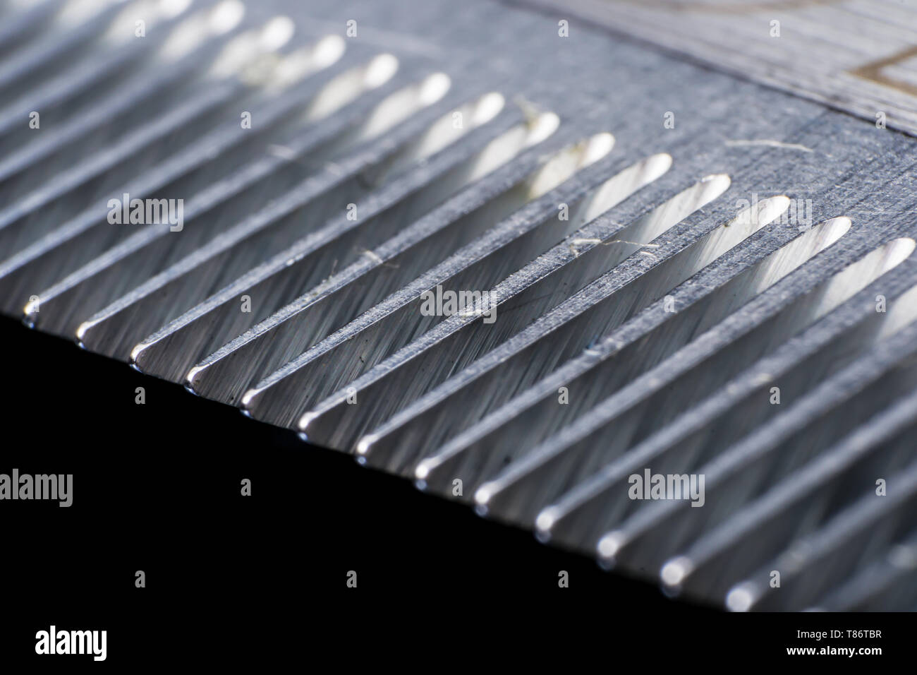 extreme macro photo of a trimming blade, Oster blade Stock Photo - Alamy