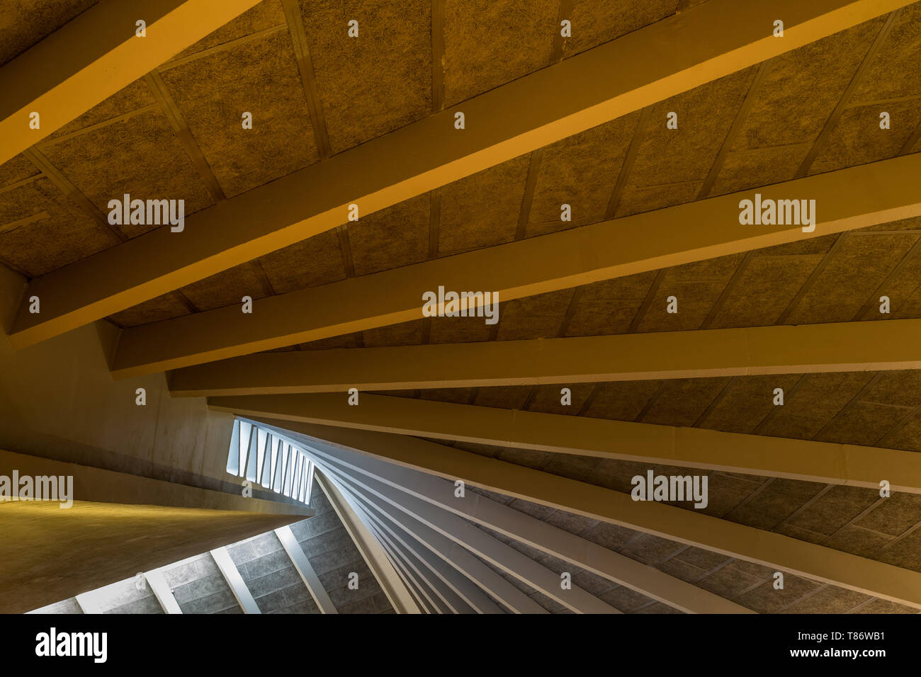 The Interior Roof Is Made Of Wood Panels And Has Natural Light To