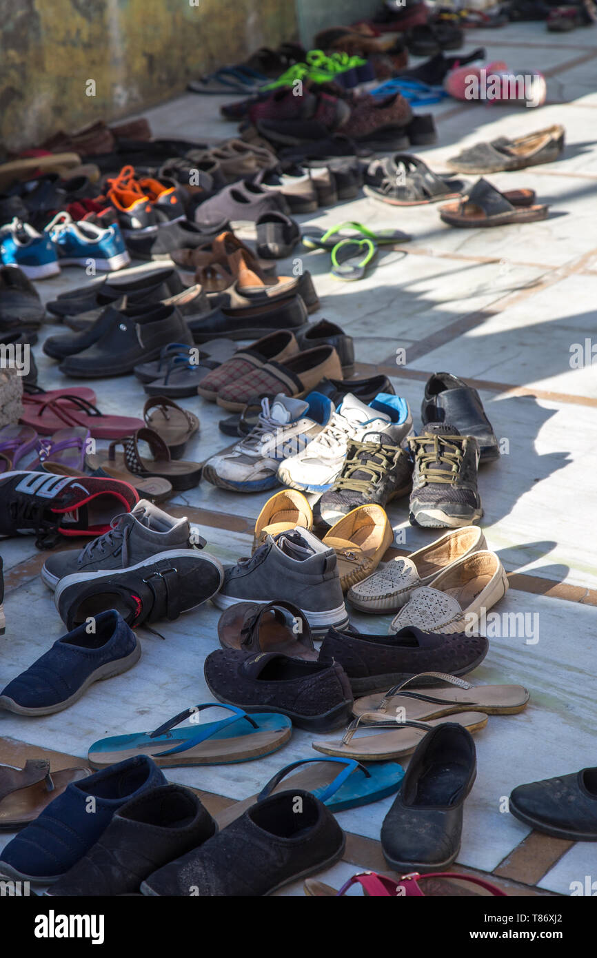 Footwear outside temple hi-res stock photography and images - Alamy